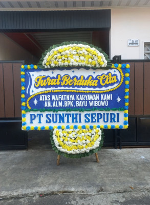Papan Bunga Duka di Kayu Ara