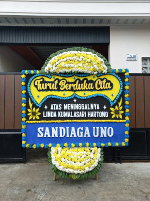 Papan Bunga Duka di Kayu Ara